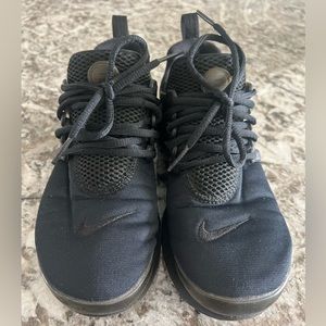 Black womans Nike Presto